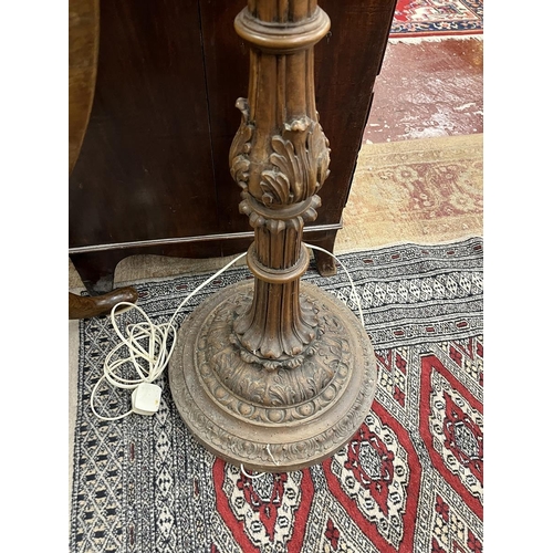 515 - Fine carved walnut standard lamp