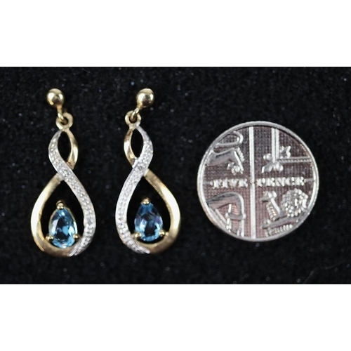 54 - 9ct gold blue topaz and diamond drop earrings