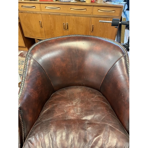 565 - Antique leather tub chair