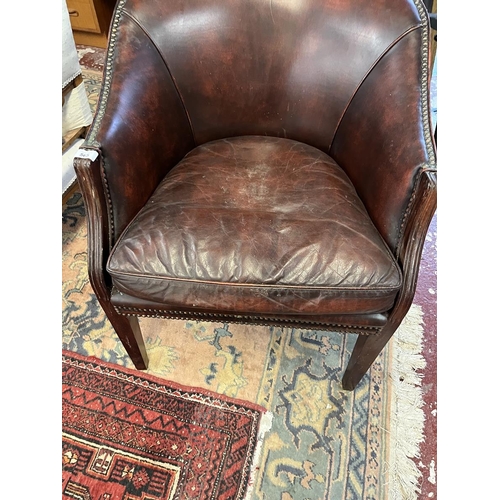 565 - Antique leather tub chair