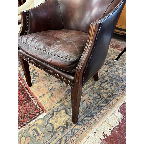 565 - Antique leather tub chair