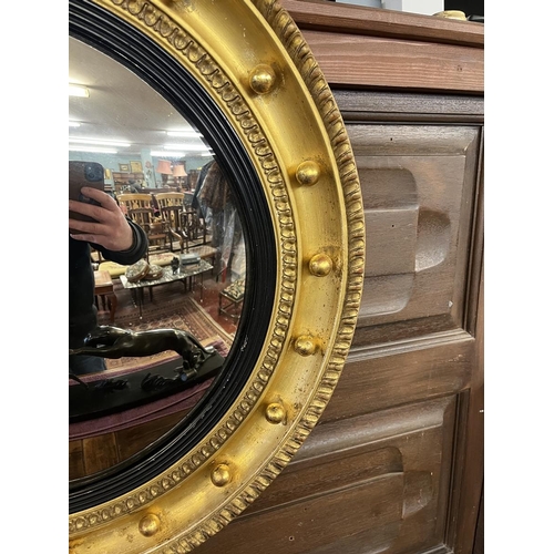 615 - Antique large gilt framed convex mirror with ebony filet - Approx D 57cm.