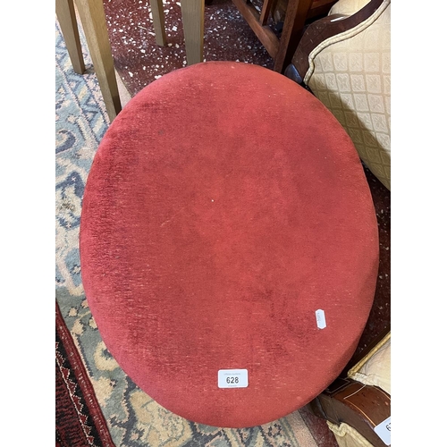 628 - Antique footstool on casters