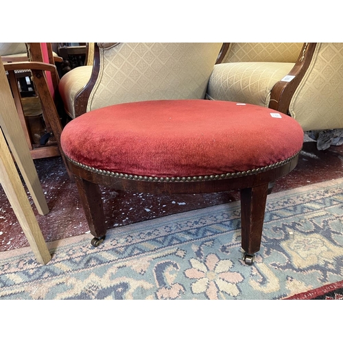 628 - Antique footstool on casters