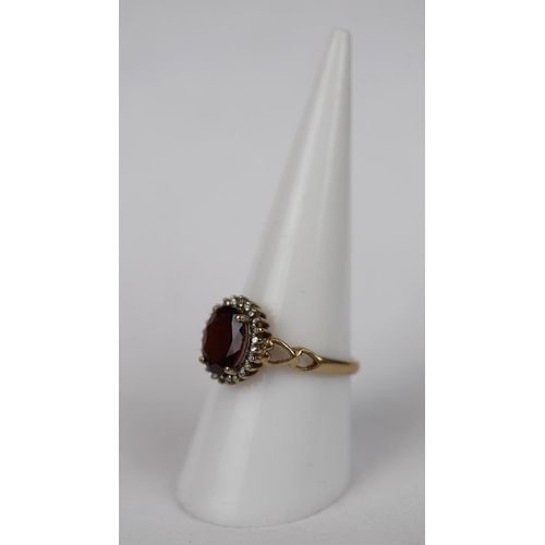 69 - 9ct gold garnet set ring - Size P