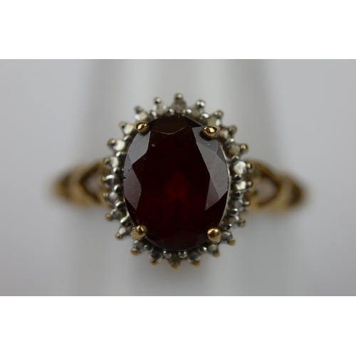 69 - 9ct gold garnet set ring - Size P