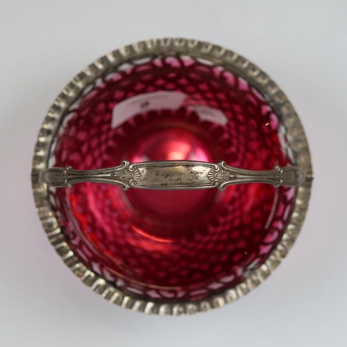 9 - Hallmarked silver pierced and ruby glass lined bonbon dish - Approx weight of silver 136g