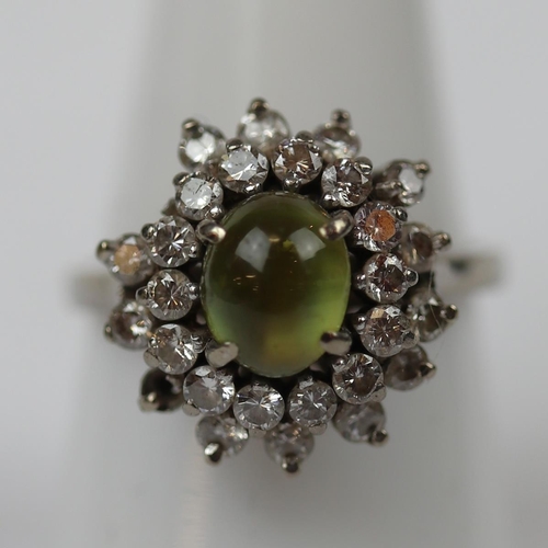 91 - 14ct white gold Chrysoberyl (cats eye) and diamond set ring - 2 stones missing