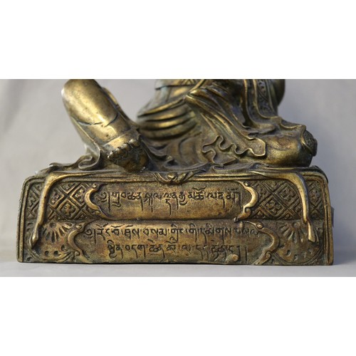 264 - Rare large antique gilt bronze lama Teacher with Tibetan/Sanskrit verse to base - Approx H: 30cm W: ... 