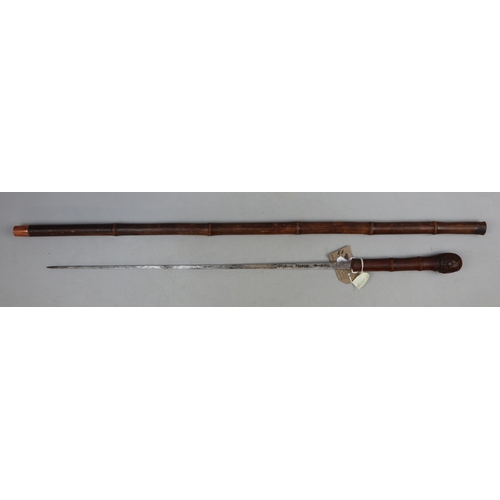 266 - Antique French sword stick with bamboo cane and root ball handle, with a square, tapered steel blade... 