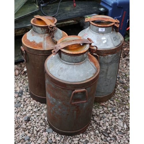 702 - 3 vintage milk churns