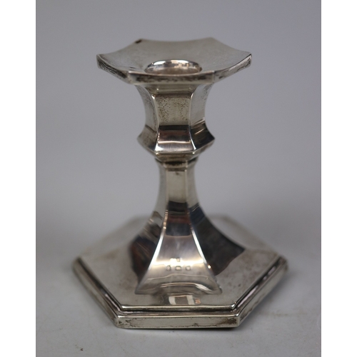 17 - Pair of hallmarked silver candlesticks together with a hallmarked silver condiment pot