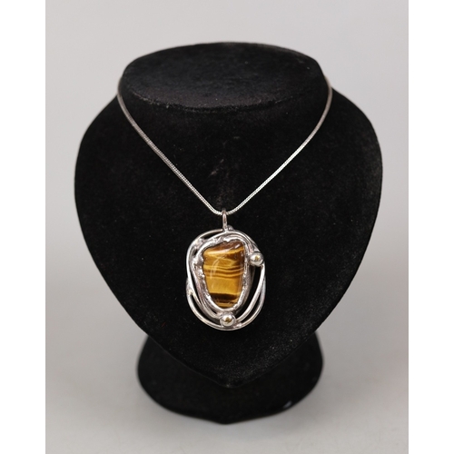 42 - Danish silver pendant set with tiger's eye on hallmarked silver chain