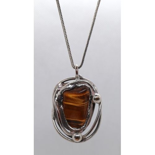 42 - Danish silver pendant set with tiger's eye on hallmarked silver chain