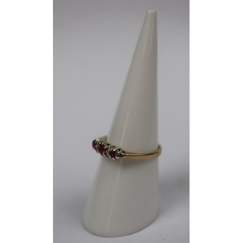 57 - 9ct gold ruby & diamond set ring - Size M