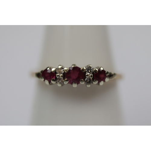 57 - 9ct gold ruby & diamond set ring - Size M