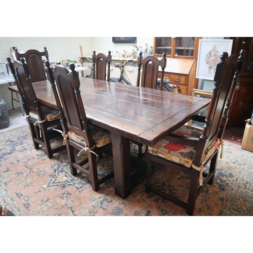 561 - Fine quality reproduction English oak refectory table together with matching set of 6 chairs includi...