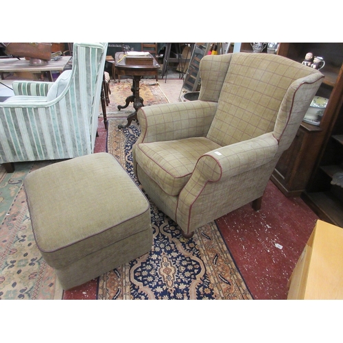 610 - Good quality wingback armchair with poof