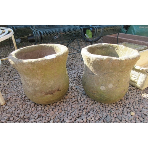 624 - Pair of round stone planters