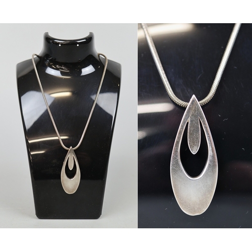 65 - Heavy silver pendant and chain