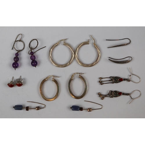 85 - 7 pairs of silver earrings