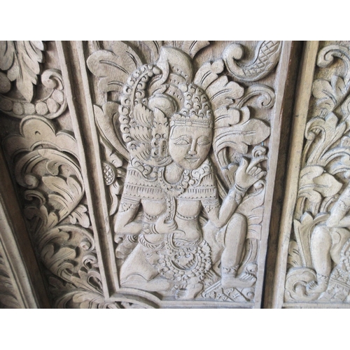 438 - Intricately carved pair of Eastern doors and doorframe - Approx size: Width of frame: 94cm H: 197cm