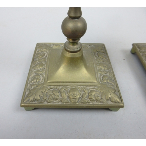 569 - 2 brass candlesticks