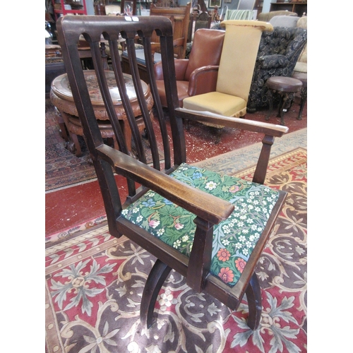 572 - Early 20thC Arts & Crafts inspired swivel chair