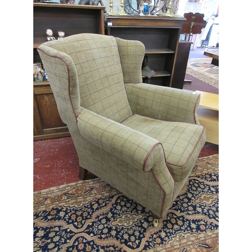 610 - Good quality wingback armchair with poof