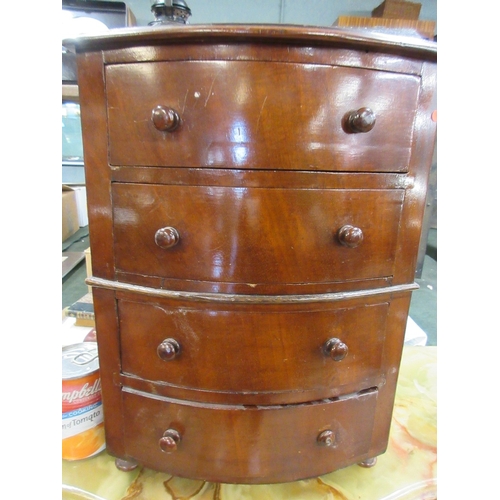 292 - Small bow fronted chest of 4 drawers