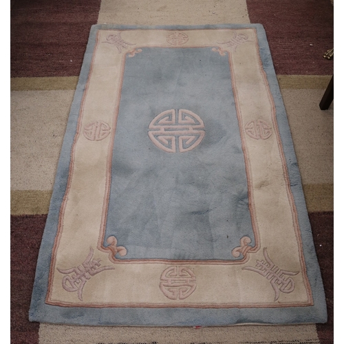 336 - Chinese superwash wool, light blue with Chinese symbols to the border. 150cm x 90cm