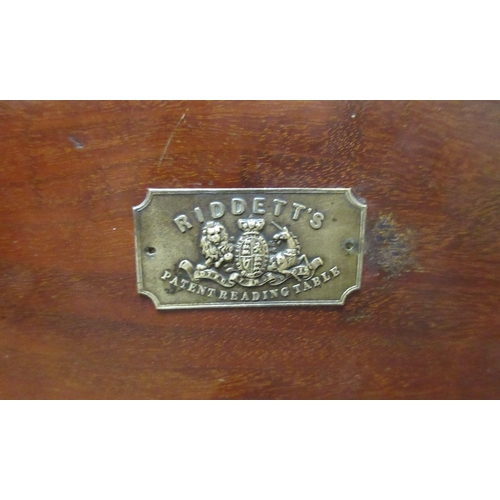 458 - Antique patent reading table by Riddetts