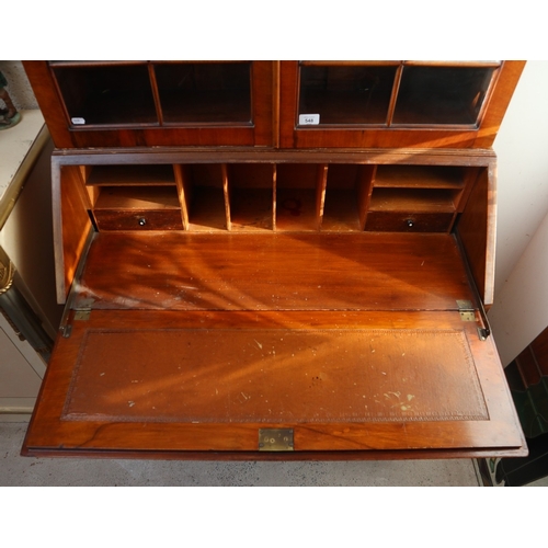 548 - Early 20th century walnut break front bookcase