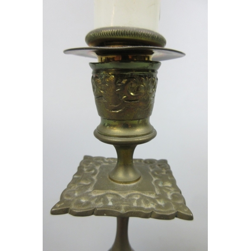 569 - 2 brass candlesticks