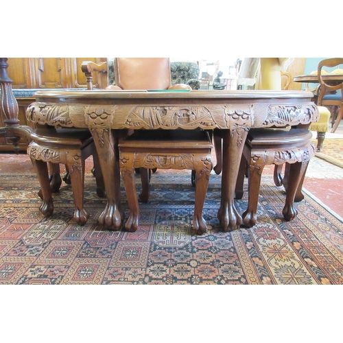 597 - Fine carved Chinese coffee table with 6 matching stools underneath - Imported from China in 1974