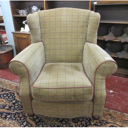 610 - Good quality wingback armchair with poof