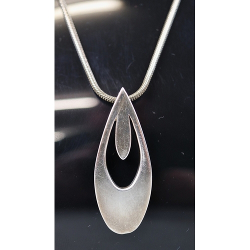 65 - Heavy silver pendant and chain