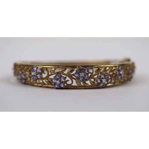 70 - 9ct gold bangle set with tanzanite & diamonds