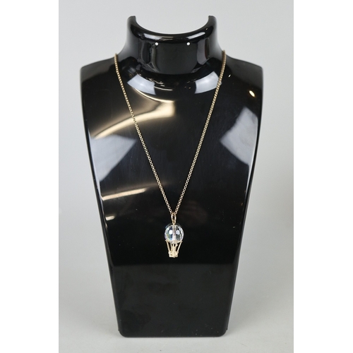 77 - Crystal pendant on 9ct gold chain