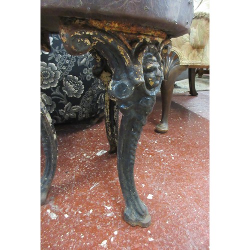 605 - Pair of antique cast iron stools