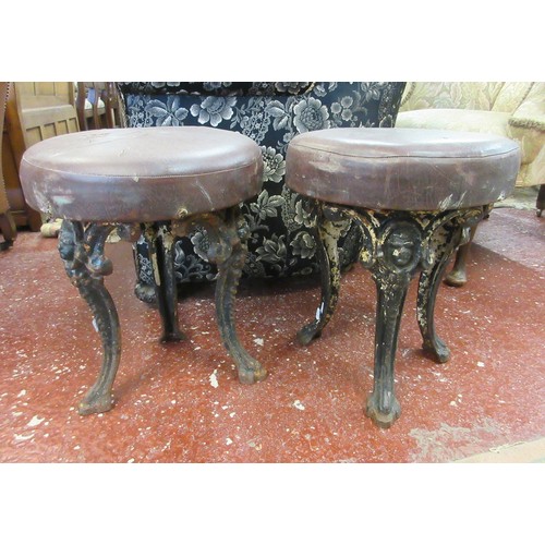 605 - Pair of antique cast iron stools