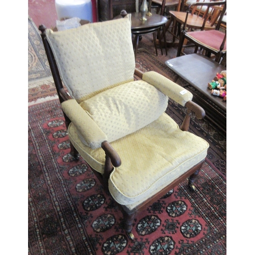 676 - Victorian stick-back armchair on casters