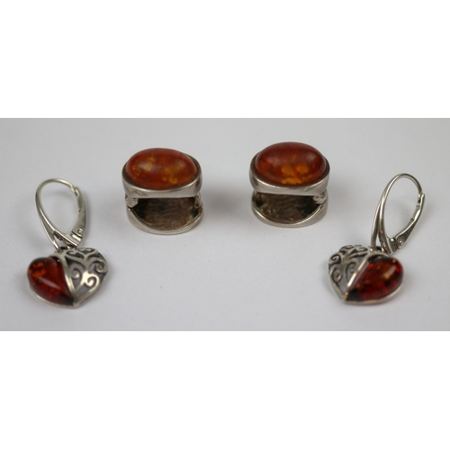 83 - 2 pairs of silver and amber earrings