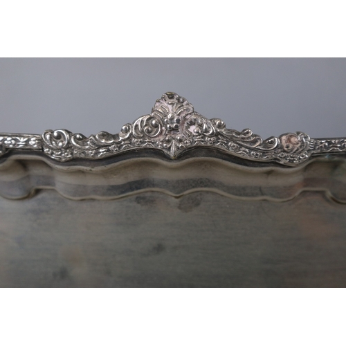 116 - Large mid 20c silver plated heavy tray 46cms x 35. Gadrooned edges and heavily decorated with two ha... 