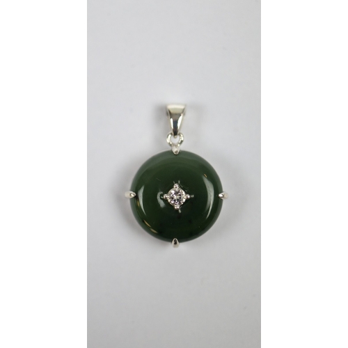 120 - Silver set jade ring together with silver set jade pendant with COA