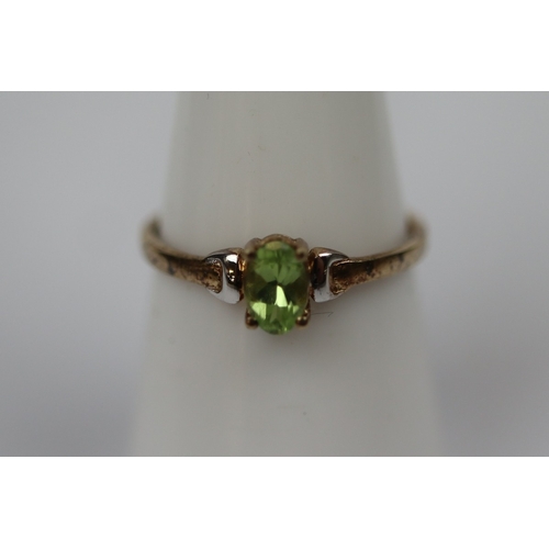 61 - 9ct gold Peridot set dress ring - Size N
