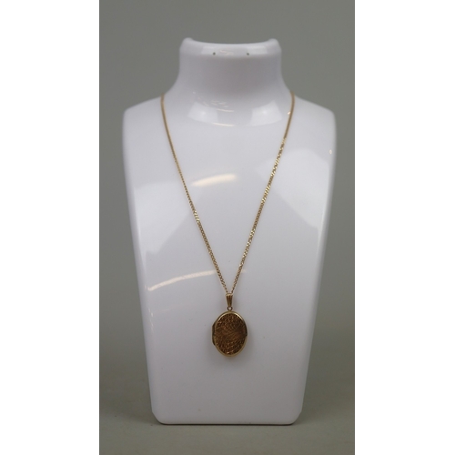 67 - 9ct gold locket and chain - Approx weight 6.4g