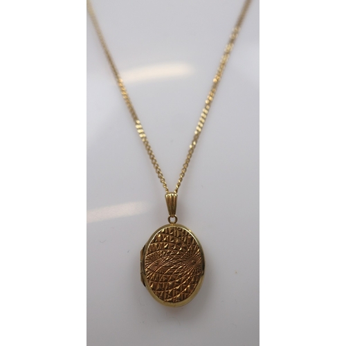 67 - 9ct gold locket and chain - Approx weight 6.4g