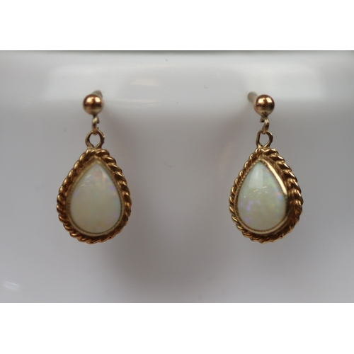 75 - 9ct gold and opal drop earrings and pendant on chain set - Approx 4.8g