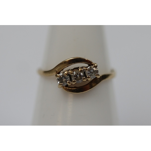 85 - 9ct gold dress ring set with 3 white stones - Size L